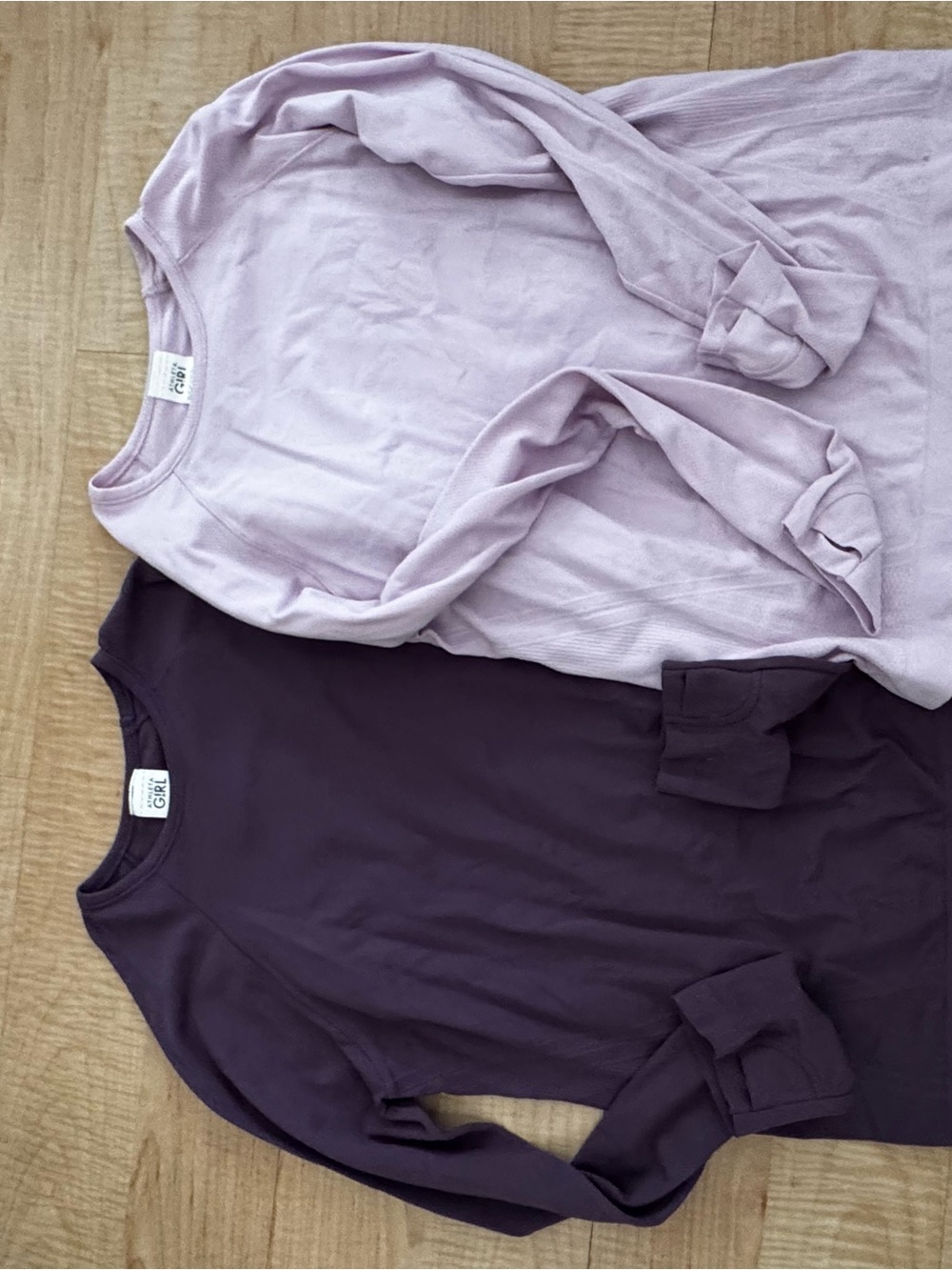 Set of Two Long Sleeve Athleta Girl tops - Lavender & Deep Plum